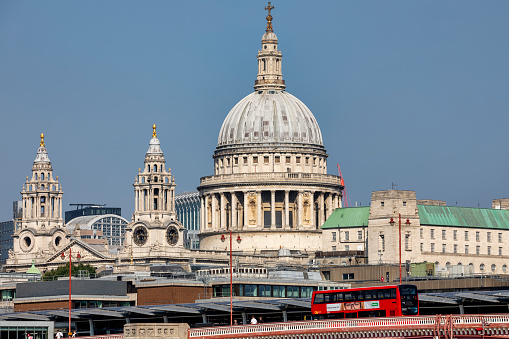 London, United Kingdom - Sep 7, 2021: Red double decker bus on Blackfriars Bridge and Saint Paul's Cathedral