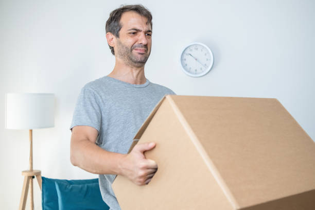 One man moving into new home and suffering from back pain
