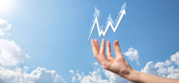 istock Businessman hold sales data and economic growth graph chart. Business planning and strategy. Analysing trading of exchange. Financial and banking. Technology digital marketing.Profit and growing plan. 1340256529