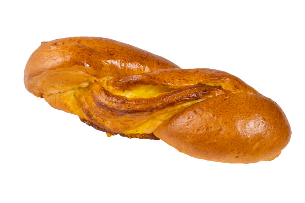 a bun with apricot filling, isolated on a white background - baked bread breakfast brown imagens e fotografias de stock