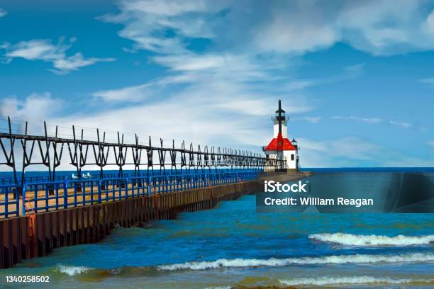 Lighthouseharbor Lighthousewith Elevated Winter Catwalkbenton Harbor Michigan Stock Photo - Download Image Now
