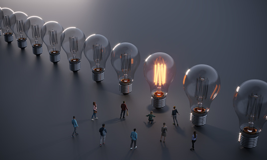 People coming to the glowing lightbulb, symbolizing big ideas, innovation concepts. (3d render)