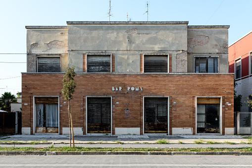Tresigallo, Italy - August 21, 2021: Example of Italian rationalism architecture from the 1930s: Bar Roma