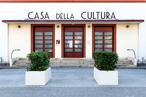 Tresigallo, Italy - August 21, 2021: Example of Italian rationalism architecture from the 1930s: Casa della Cultura (House of Culture)