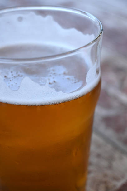istock Selective focus of beer foam with copy space 1340262410