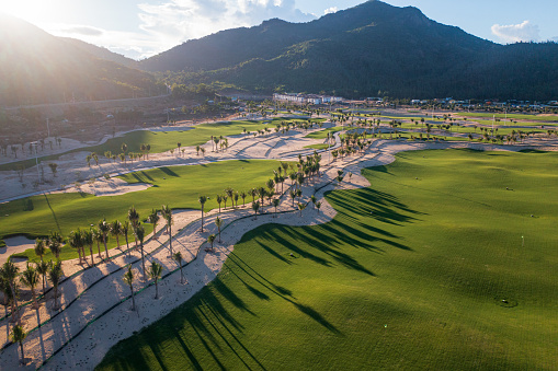 Drone view of a golf hill with green grass field - Khanh Hoa  province, central Vietnam