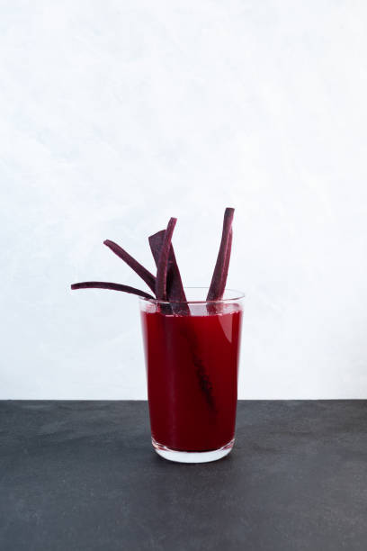 istock Salgam or fermented beet juice. Popular Turkish drink. Traditional beverage made with water, purple carrot or turnip (juice). Selective focus, vertical orientation 1340266942
