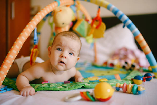 istock Cute Baby Lying At Home 1340270668