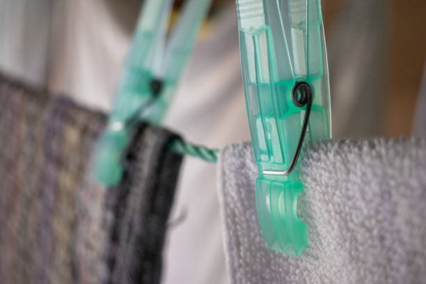 istock Plastic clothespin close up holding a towel 1340271974