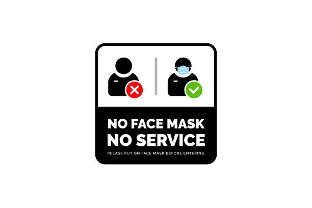 istock Face mask required warning prevention sign. Human profile silhouette with face mask in rounded rectangular frame 1340272836