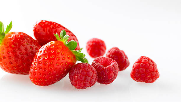 istock Strawberry and raspberries on white background 134027422