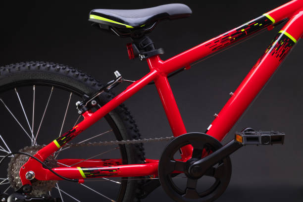 istock Sport mountain red bicycle isolated on black background 1340277233