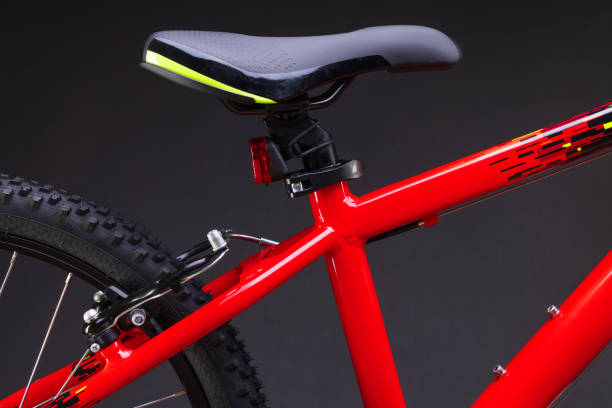 istock Sport mountain red bicycle isolated on black background 1340277235
