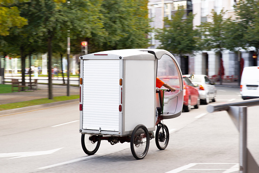 Sustainable delivery cargo bike in a city