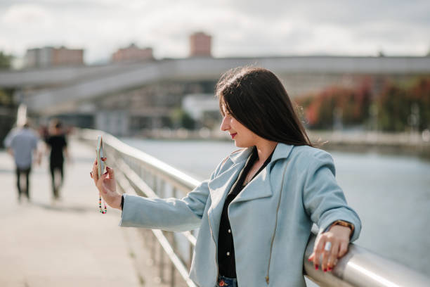 istock Young woman taking a selfie picture 1340277743