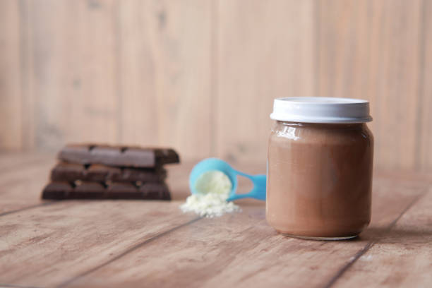 istock baby food in a container on table with copy space. 1340277962