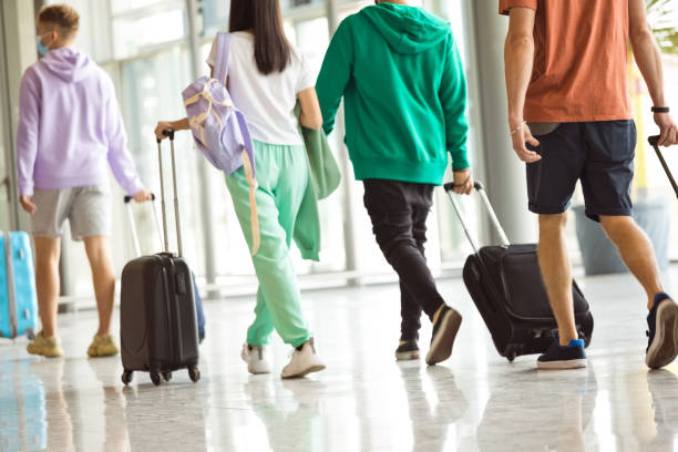 istock Passengers at the airport with luggage 1340279870