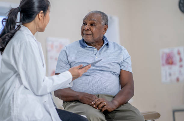 istock African male senior at the doctors office 1340279910