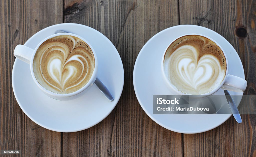 cappuccino two cups of coffee cappuccino Two Objects Stock Photo