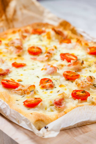 istock homemade pizza with shrimps and tomatoes 1340282219