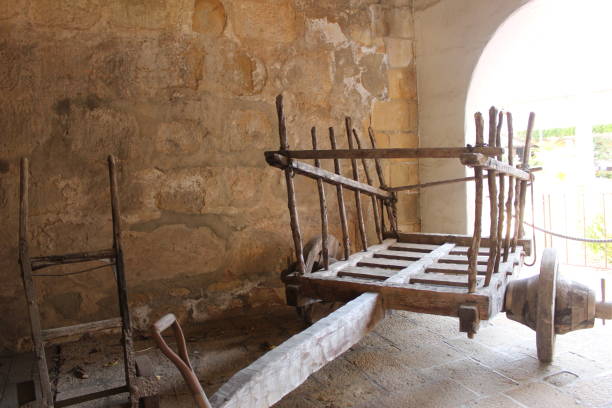 istock Ancient wooden wheel barrow 1340282579