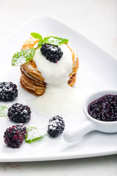 istock pancakes with blackberries and cream 1340284297