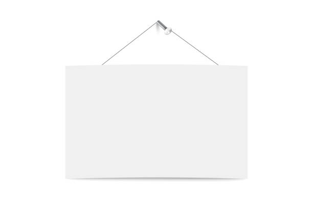 istock Blank white board hanging on string on metal straight nail hammered in wall. 1340287836