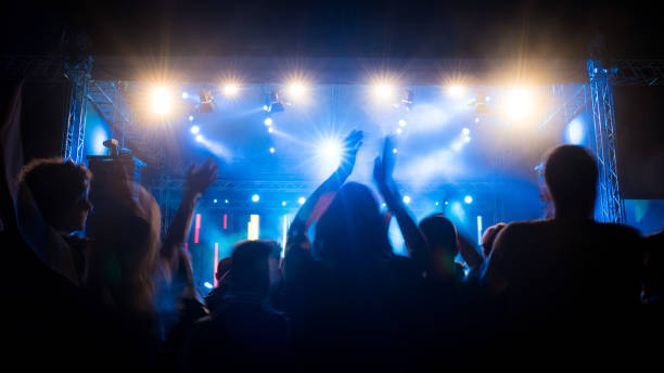istock Illuminated stage on rock concert from audience 1340290854