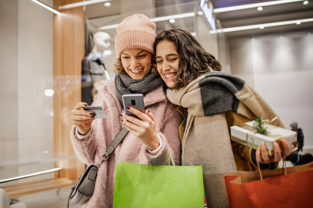 istock Friends doing shopping in the city 1340291227