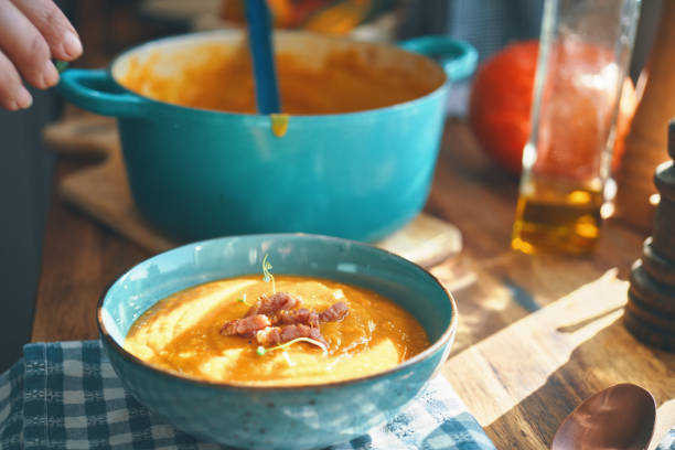 istock Preparing Pumpkin Soup with Bacon and Thyme 1340294416