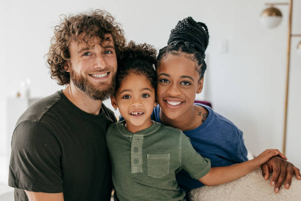 istock Happy family with one cute child 1340295560