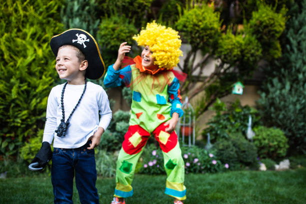 Clown at children birthday party entertaining the kids