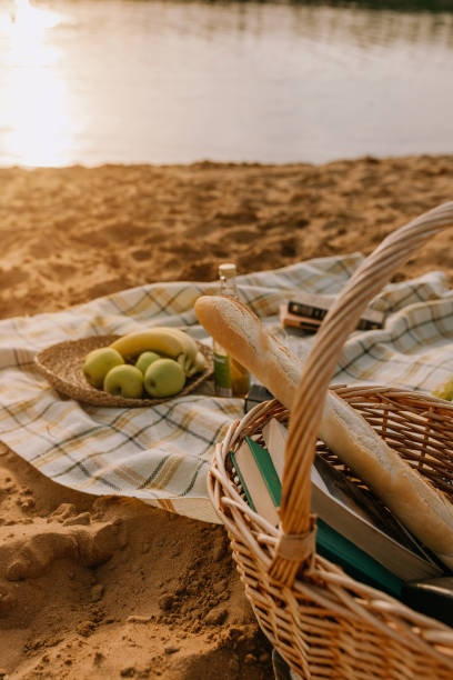 istock picnic on the lake shore 1340296847