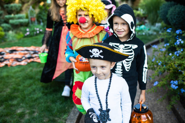 istock Kids trick-or-treating on Halloween 1340298036