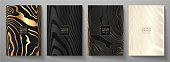 istock Modern elegant cover design set. Luxury fashionable background with black and gold line pattern 1340306397
