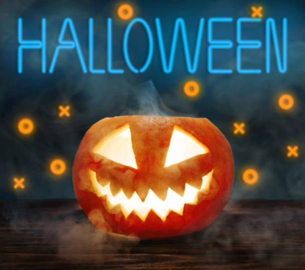 istock Jack-o-lantern pumpkin with smoke and neon sign Halloween. 1340315204