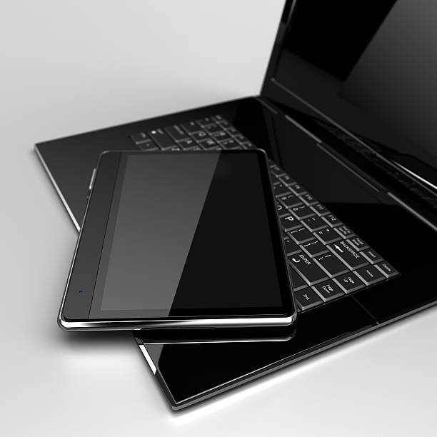 istock Digital pad and laptop in depth of field 134031966