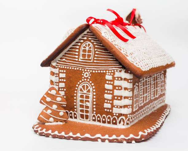 Gingerbread cookies and decorations. Focus on gingerbread man.