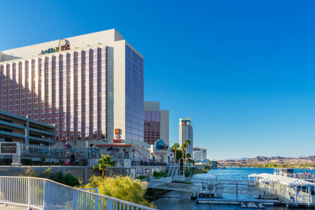Laughlin, NV, USA – August 27, 2021: View of the Aquarius and the Riverside hotels and casinos on the Colorado River in Laughlin, Nevada.