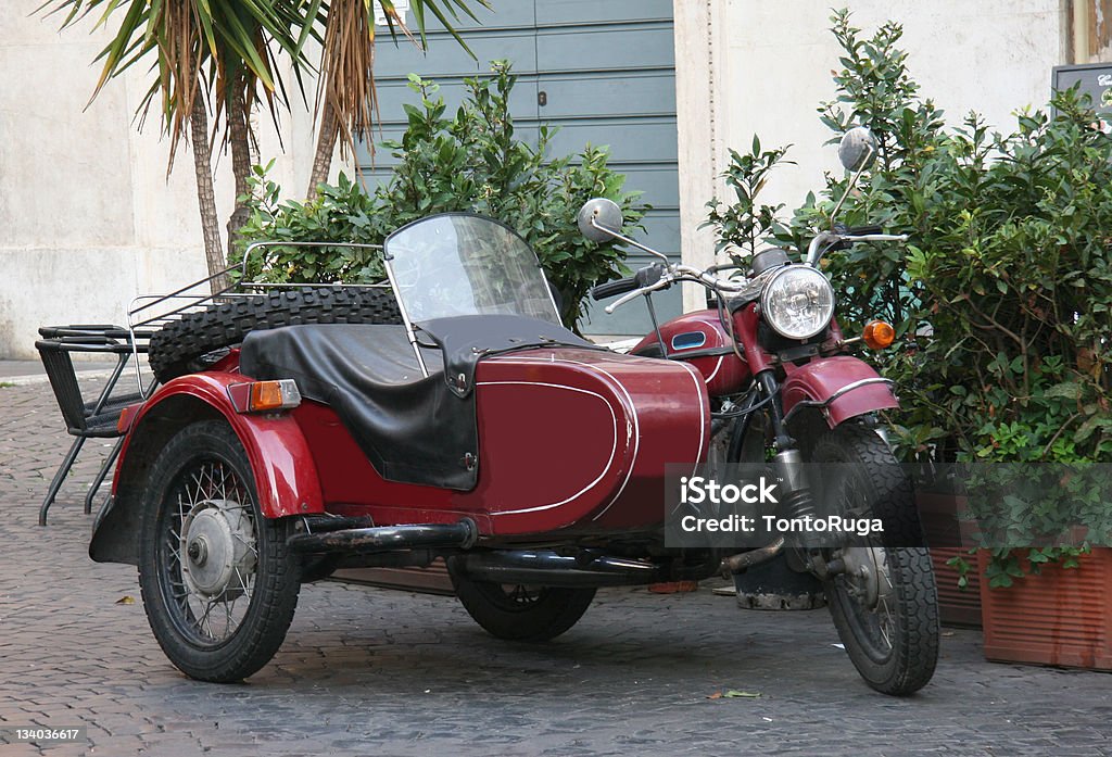 Red and Black Retro Motorcycle with Sidecar Combination Old red retro motorcycle with Sidecar Combination Motorcycle Stock Photo