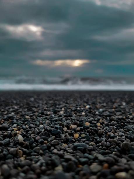 pebbles on the beach pebbles on the beach in the afternoon when the sun goes down, located in the city of Banda Aceh, usually these pebbles gather because of the currents of the waves from the sea. joule stock pictures, royalty-free photos & images