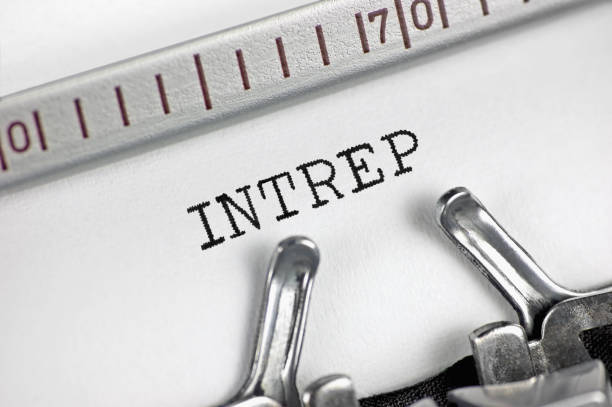 istock Intelligence report acronym INTREP text macro closeup, typewriter typed intel insight facts summary reporting document concept, brief concise operations issues memo bulletin notice for operational actions and decisions planning, information letter message 1340383231