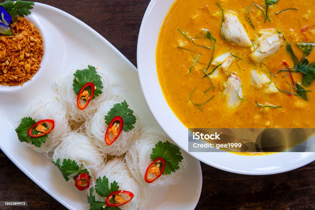 Thai food Coconut milk curry with crab and Fried crab in yellow curry. vegetable. Curry - Meal Stock Photo