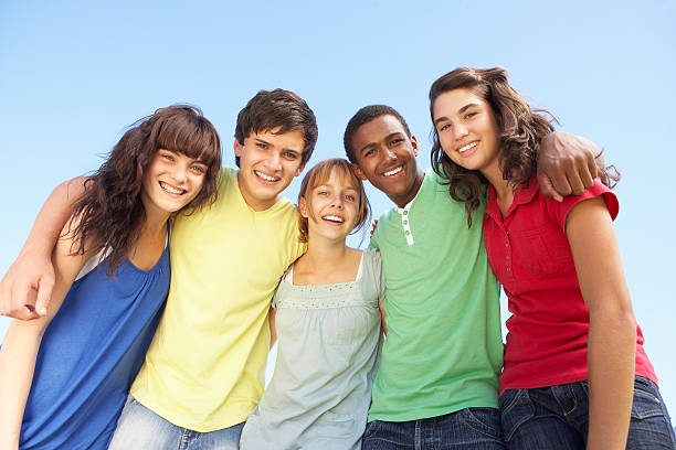 Teenage Friends Standing Outside Group Of Teenage Friends Standing Outside teenagers only stock pictures, royalty-free photos & images