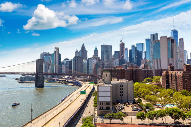 istock Brooklyn Bridge and Manhattan in a sunny day 1340396079