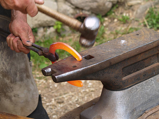 istock Farrier and Red Hot Shoe 134039642