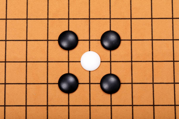 istock chinese game go,  Gobang and go game board 1340399300