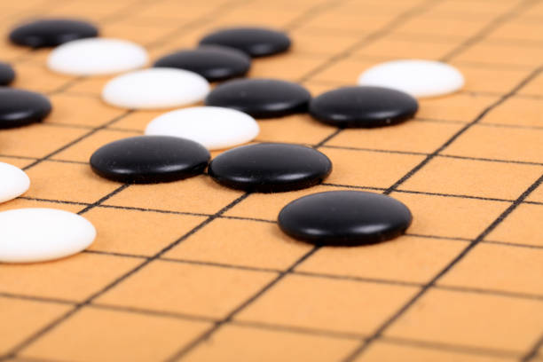 istock chinese game go,  Gobang and go game board 1340399349