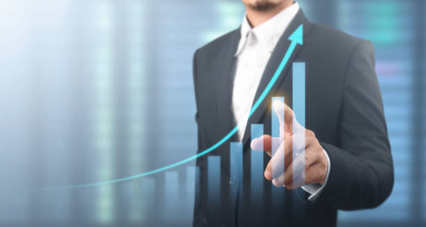istock Businessman plan graph growth and increase of chart positive indicators 1340402731