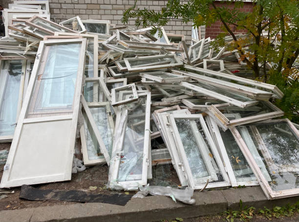 istock Old windows and doors. Unnecessary windows and doors abandoned on the street 1340404281